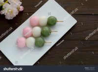 stock-photo--hanami-dango-is-a-japanese-dessert-where-different-dango-balls-pink-white-and-gre...jpg